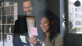 woman looking at notecard
